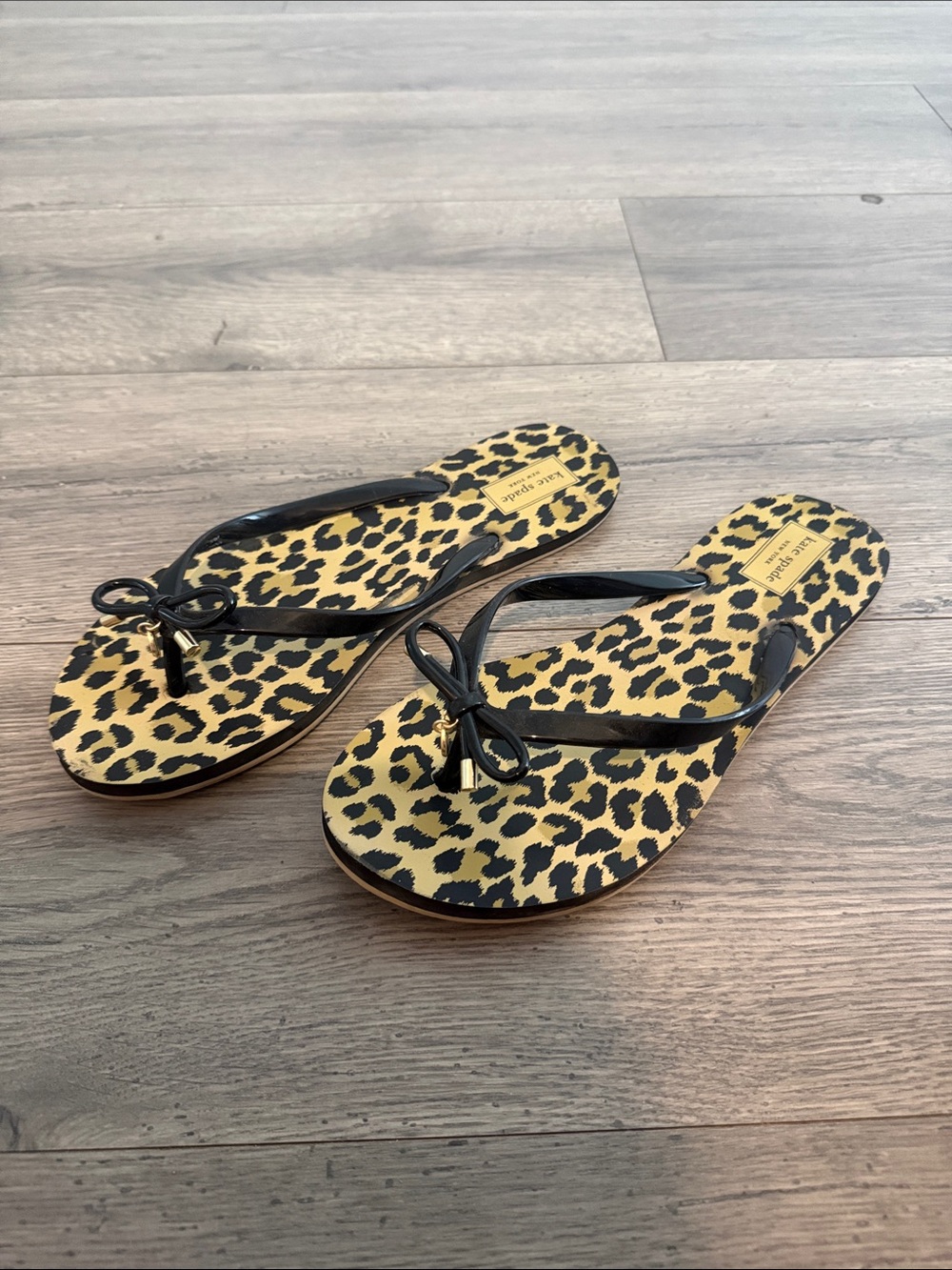 kate spade Leopard Print Flip Flop Sandals with Black Straps